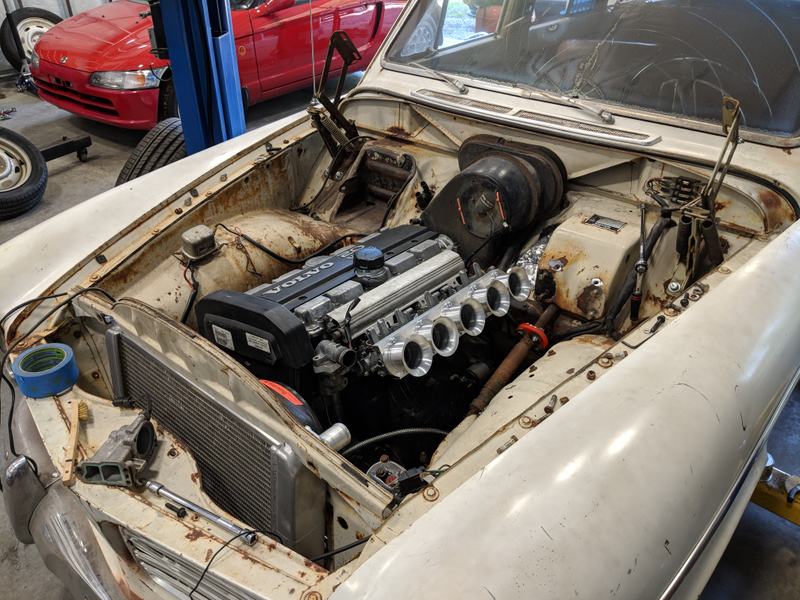 The new Volvo 850-sourced inline-five engine with those shiny ITBs.